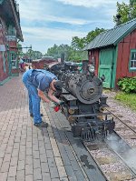 Engineer Ken oils R&GN 1916 in preparation for the next run